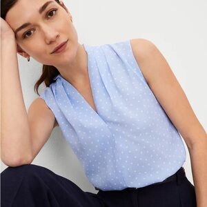 Ann Taylor Blue Sleeveless Blouse with V-neck and Relaxed Fit
